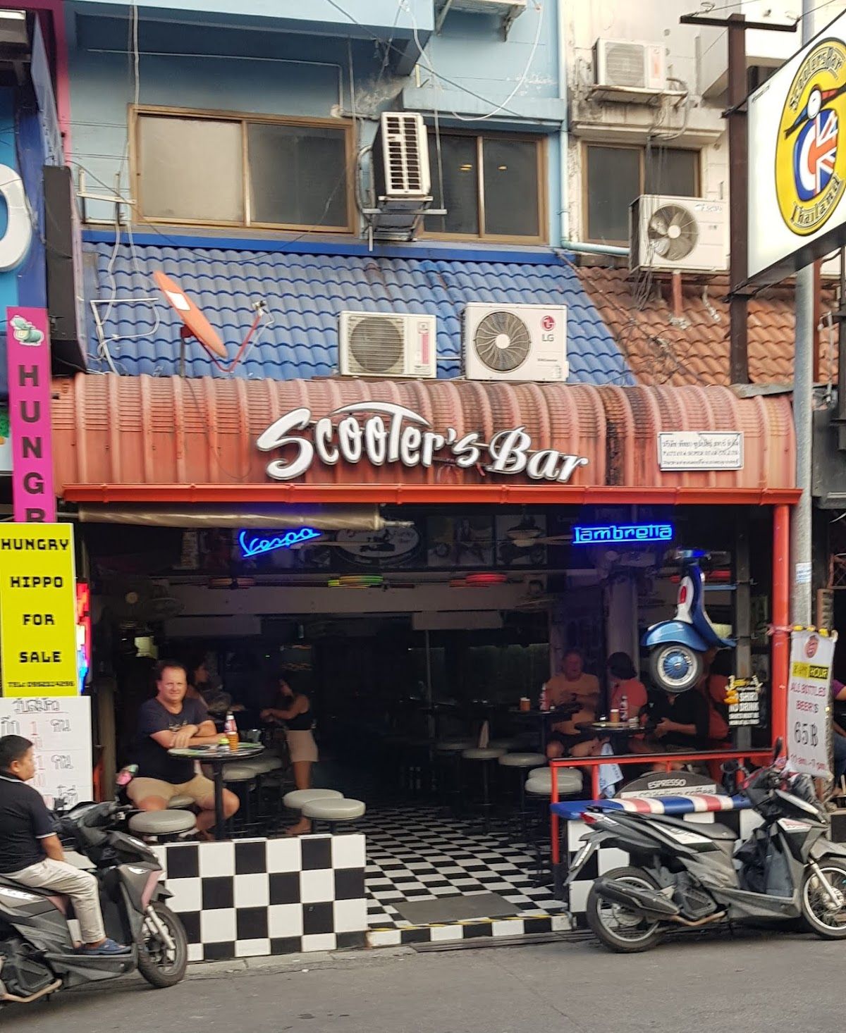 Scooter's Bar on Soi Buakhao Pattaya, a classic open-fronted bar with Vespa and Lambretta branding on the city's main expat nightlife strip